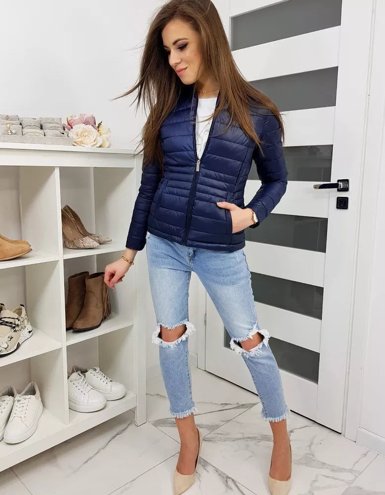 Tumši zila sieviešu jaka Par mums