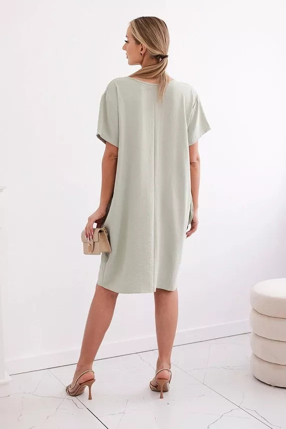 Pelēka kleita ar kabatām un kulonu Deli 