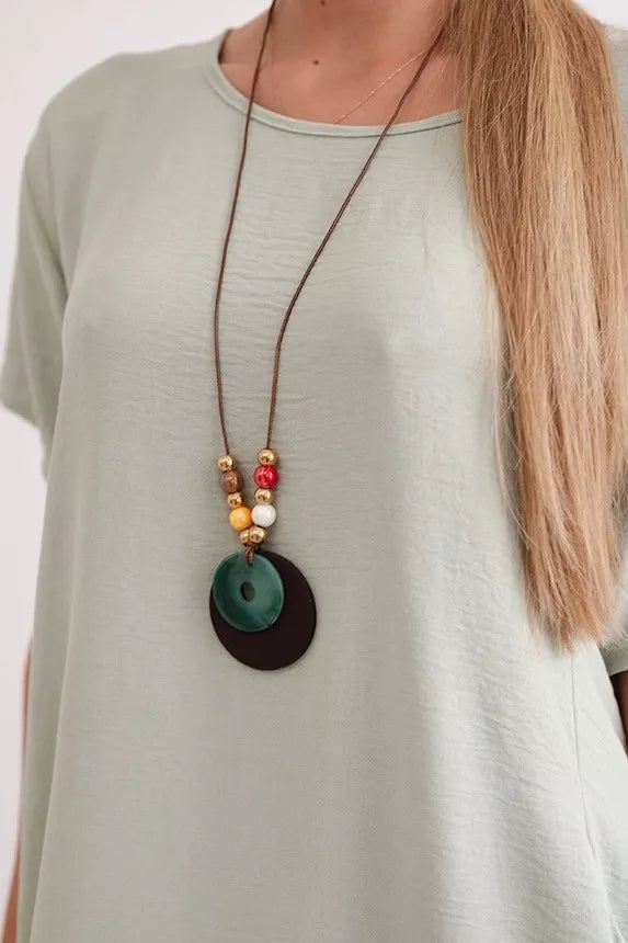 Pelēka kleita ar kabatām un kulonu Deli 