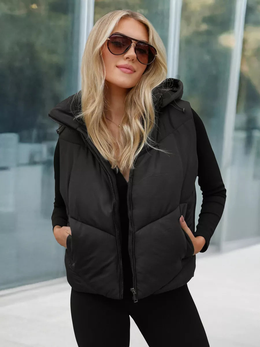 Sieviešu melna veste Gusti