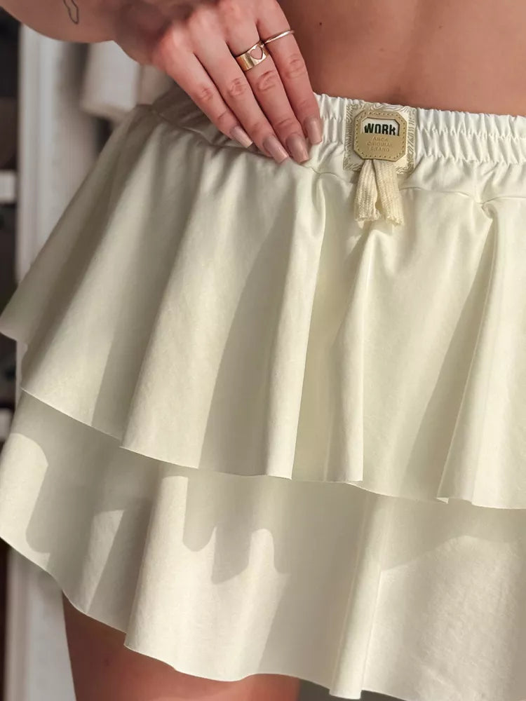 Sieviešu balti mini svārki Falbela