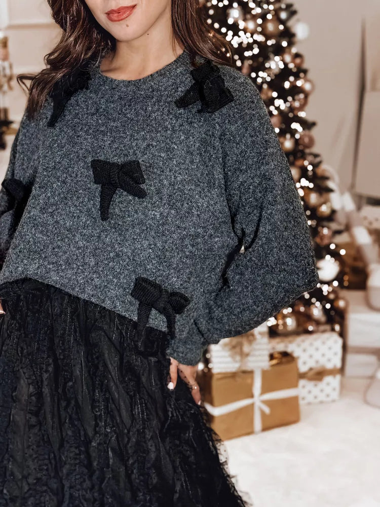 Sieviešu melns džemperis ar bantīti