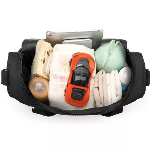 Melna ratiņu soma ar ziedu rakstu mazulim